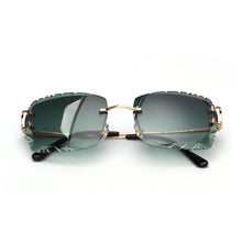 Load image into Gallery viewer, Ruiao Luxury high quality rimless diamond cut nylon lens UV400 Sunglasses fashion square metal legs glasses for men women
