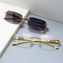 Load image into Gallery viewer, Fashion Vintage Rimless Square Sunglasses Women Men Luxury Brand Designer Popular Travel Driving Leopard Head Small Sun Glasses
